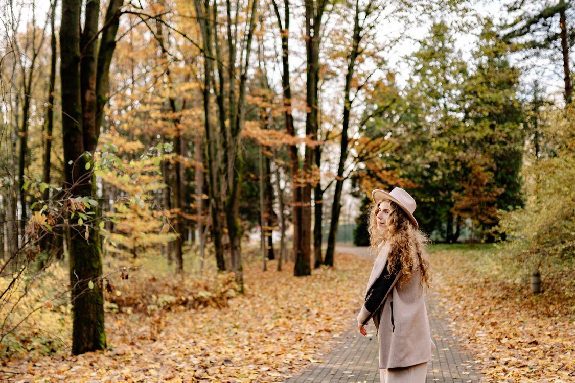 Person taking a morning walk in daylight to support a healthy sleep schedule