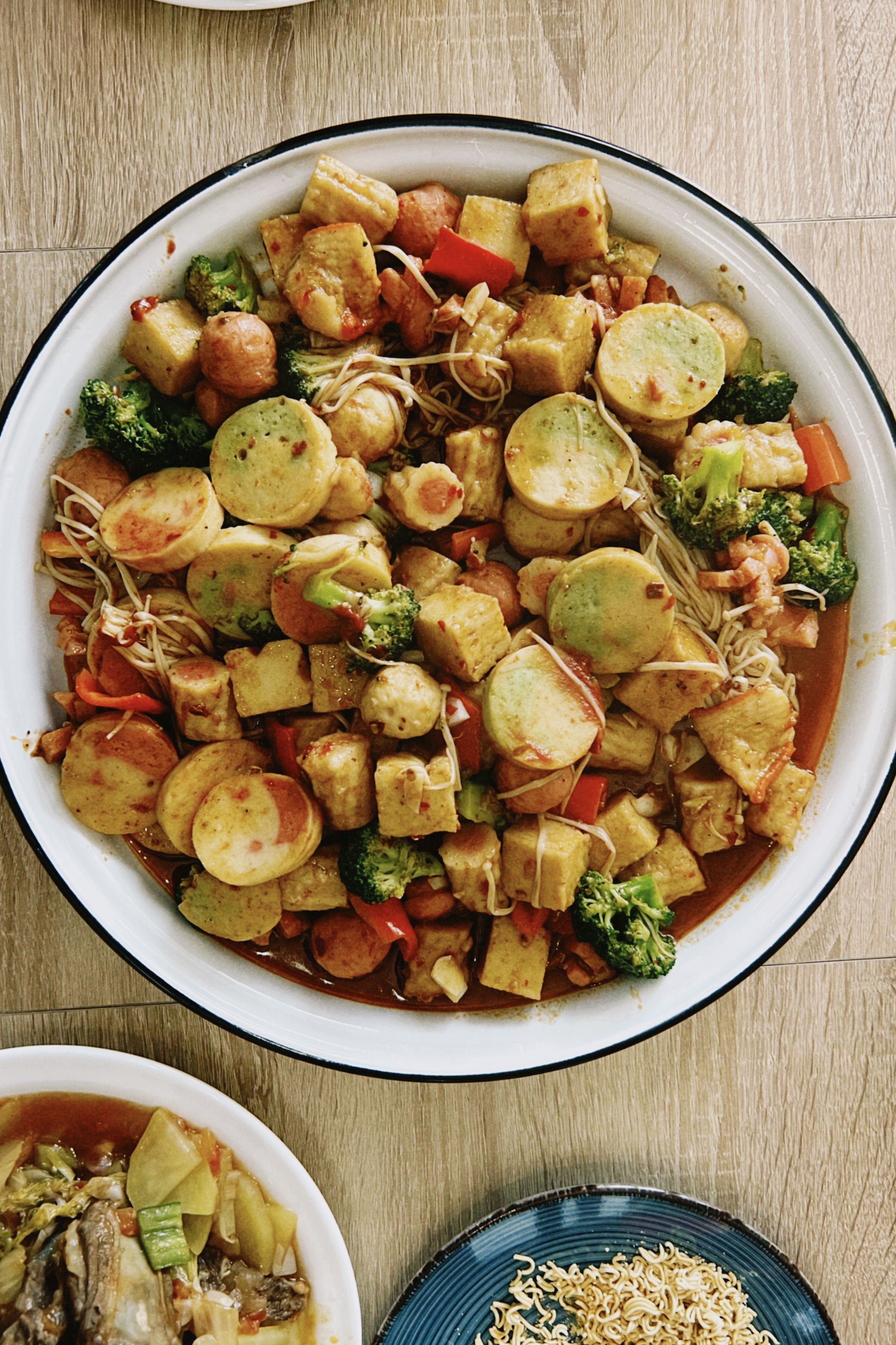 Colorful vegan stir fry featuring broccoli, tofu, and sweet potatoes