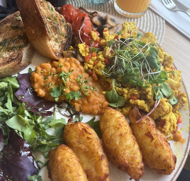 Vegan healthy breakfast with tofu scramble and toast